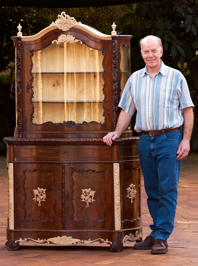 Bruce Weier with restored glass case